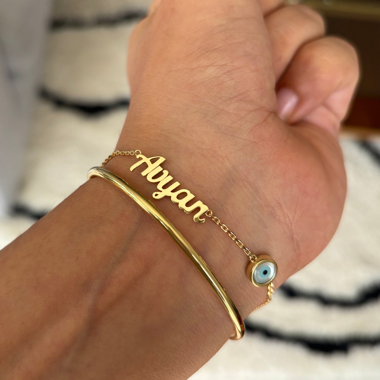 Name Bracelet With an Evil Eye
