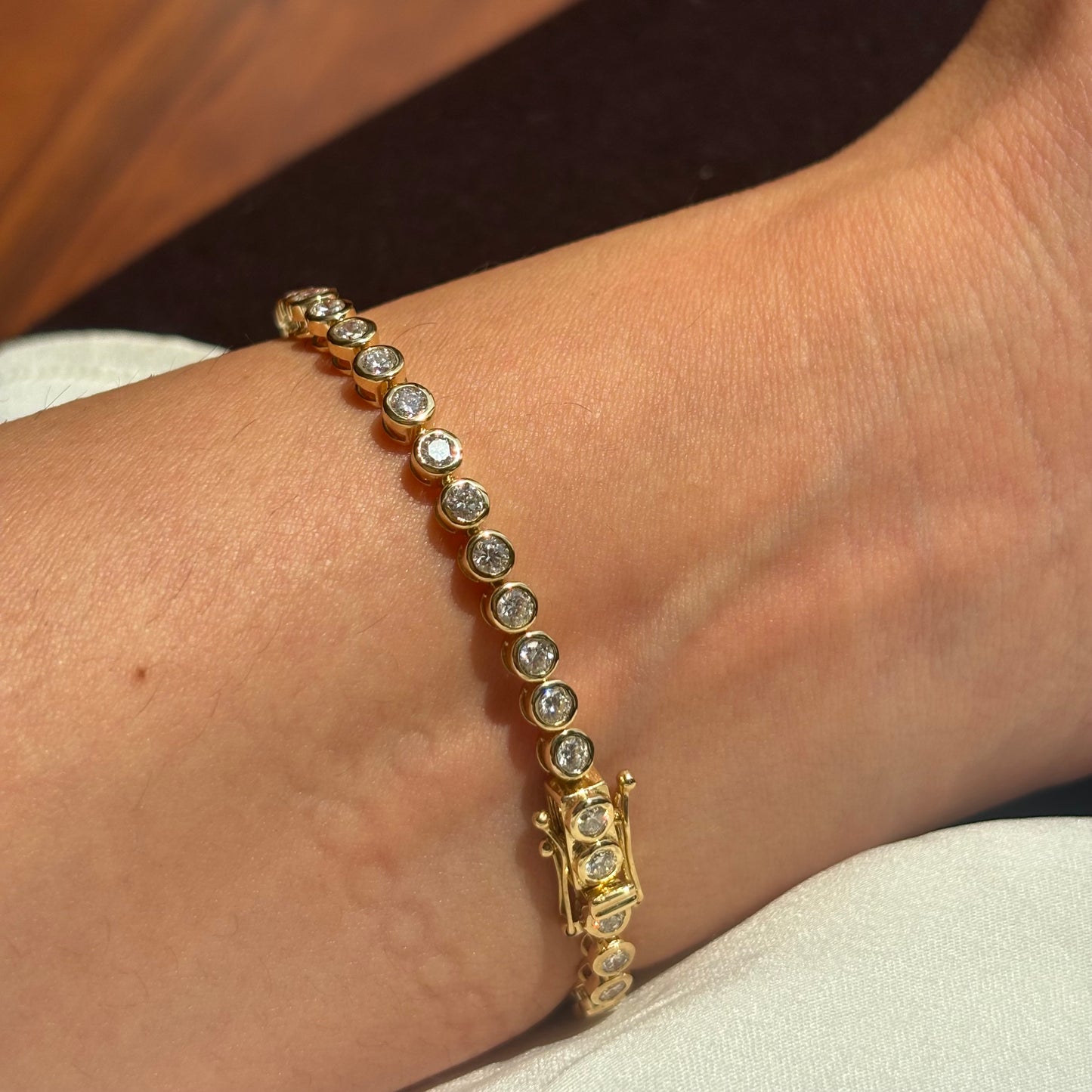 Graduated Bezel Set Diamond Tennis Bracelet