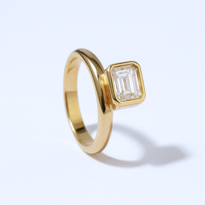 Bezel Set Emerald Cut Dome Diamond Ring
