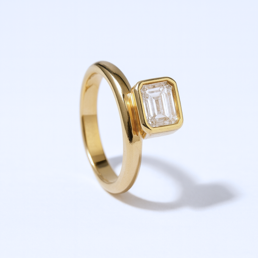 Bezel Set Emerald Cut Dome Diamond Ring