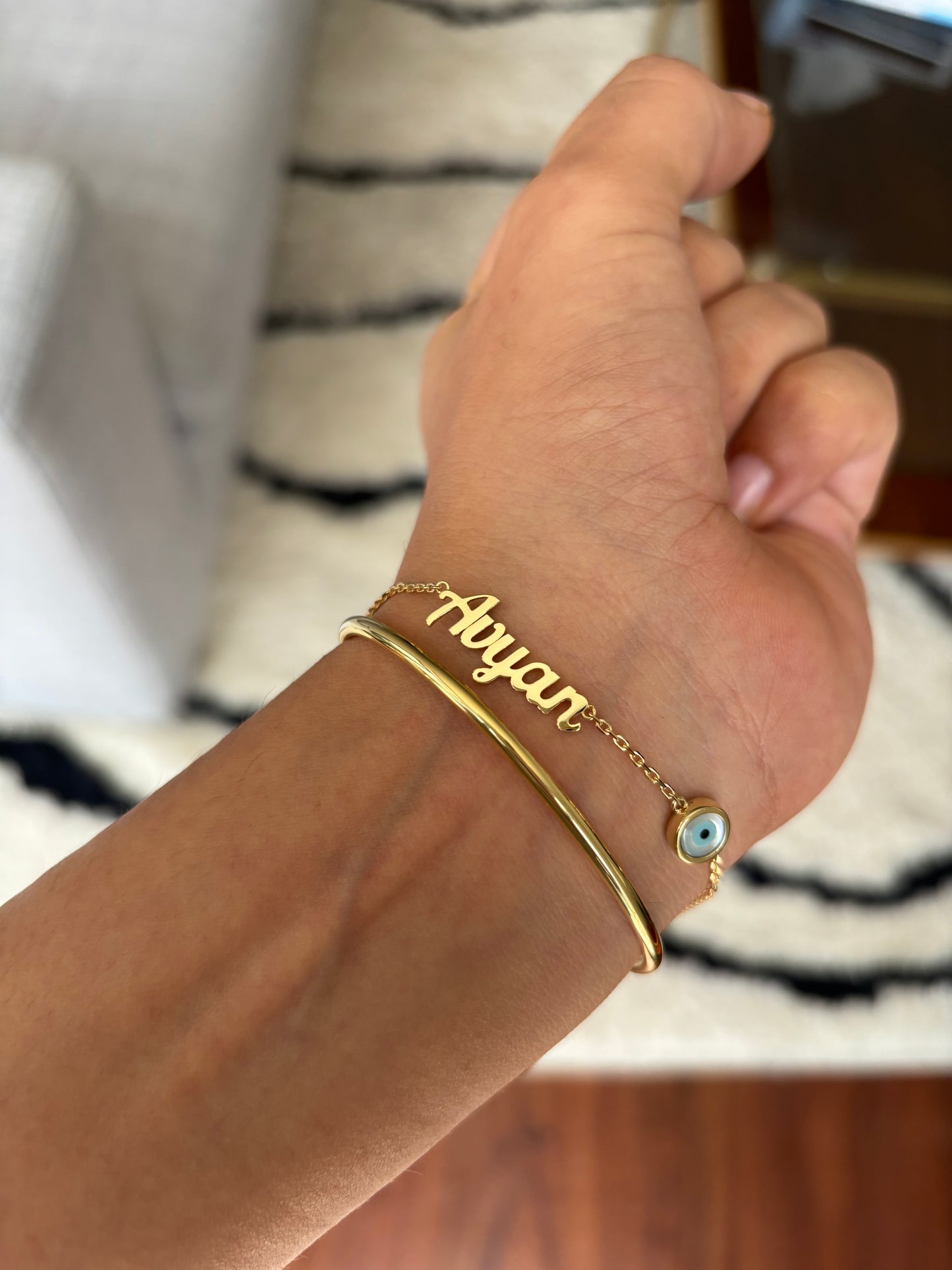 Name Bracelet With an Evil Eye