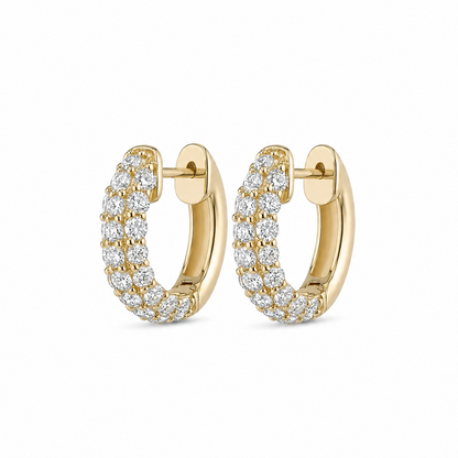 Gold hoop earrings with diamond accents on a white background