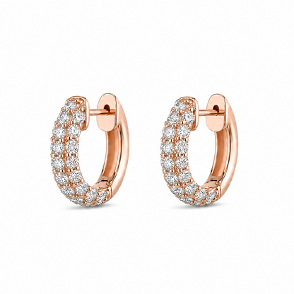 Rose gold hoop earrings with diamond accents on a white background
