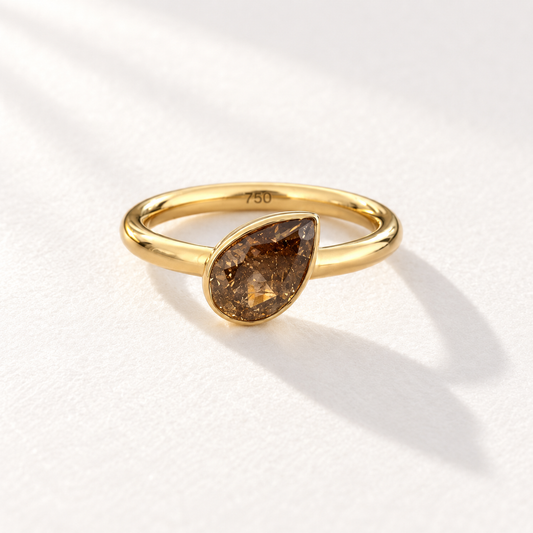 Ember 18K gold ring with a one-carat lab-grown brown pear diamond, front view