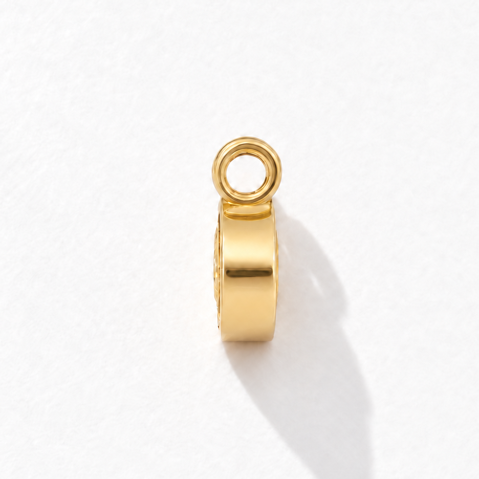 Solstice 2 carat IGI-certified yellow oval diamond charm in 18K gold, side view