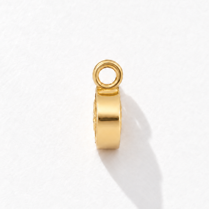 Solstice 2 carat IGI-certified yellow oval diamond charm in 18K gold, side view