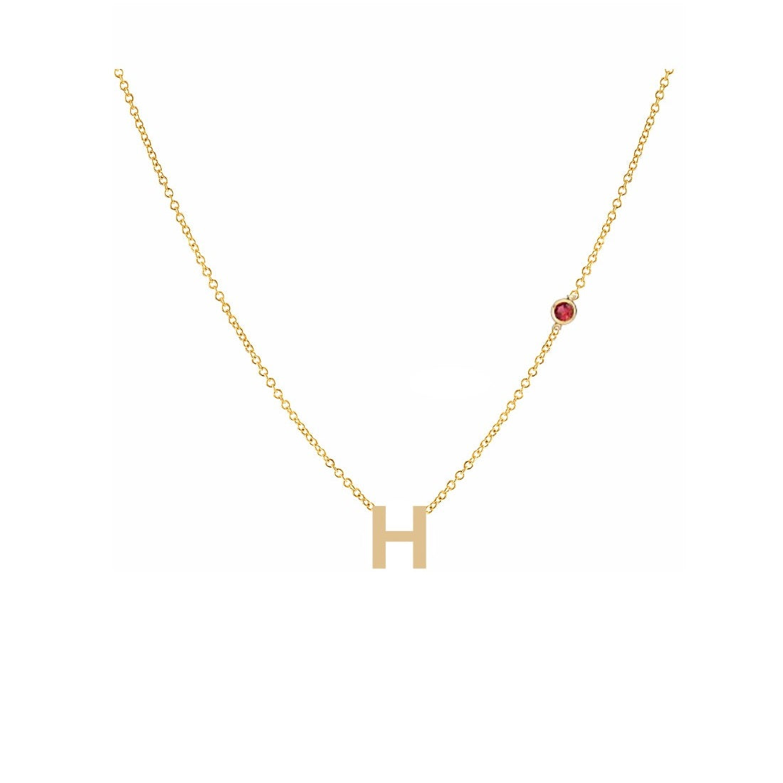 18K yellow gold H initial necklace with a red bezel-set birthstone on a white background